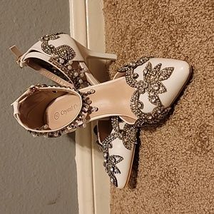 White pumps that dazzle.